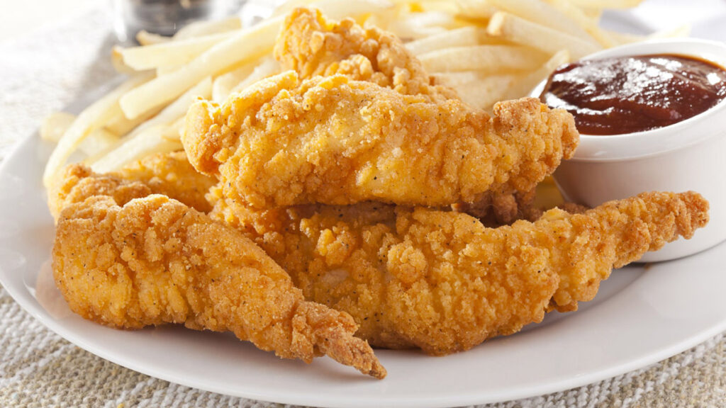 Chicken tenders on a plate. 